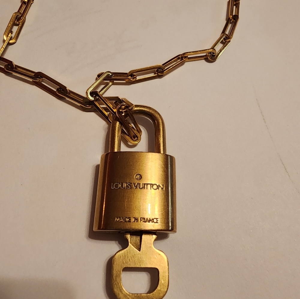 Authentic LV pad luck and key